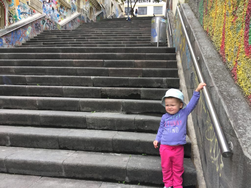 Preparing for the trek up the stairs we use on our way home from the kids’ Ecuador school. Marcella insists on doing them all on her own.